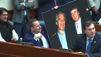 Jared Moskowitz holds up photo of Trump and Epstein